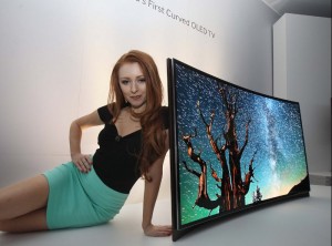 Photo of model with Samsung OLED TV