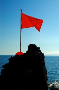 Photo of red flag flying