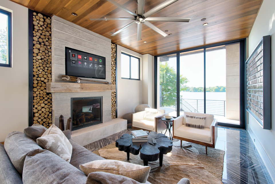 Control4 livingroom scene with OS3 displayed on flat panel TV