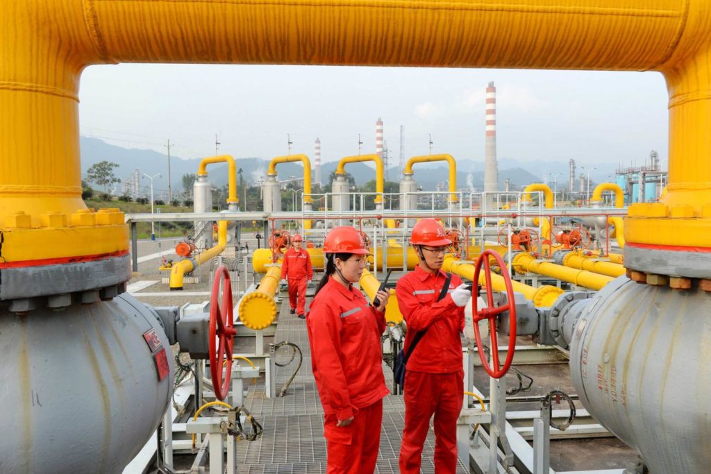 China leads the world as suggested by this photo of Chinese petrochemical workers