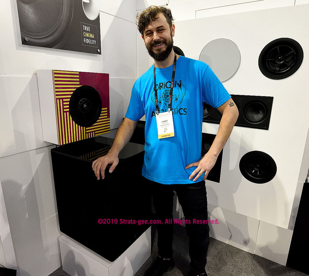 Origin's Aaron Cattoir at CEDIA19 with a big subwoofer