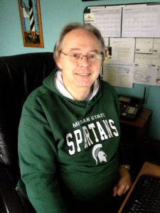 Photo of Ted Green in Michigan State Spartan sweatshirt