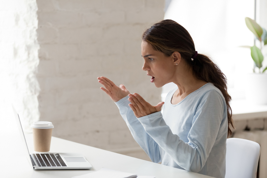 photo of girl on laptop, needs to add Strata-gee's trial 'Like' button