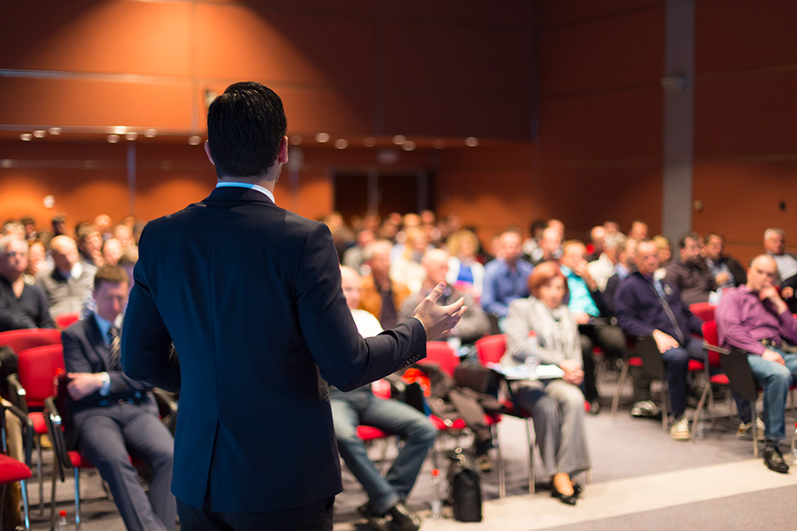 business guru at a trade conference