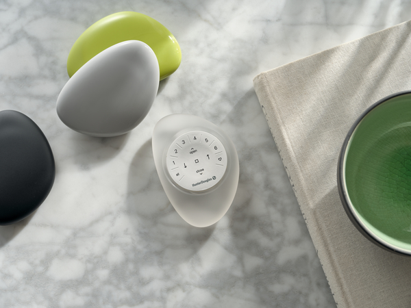 The Pebble remote, part of PowerView+ wired power and control solution