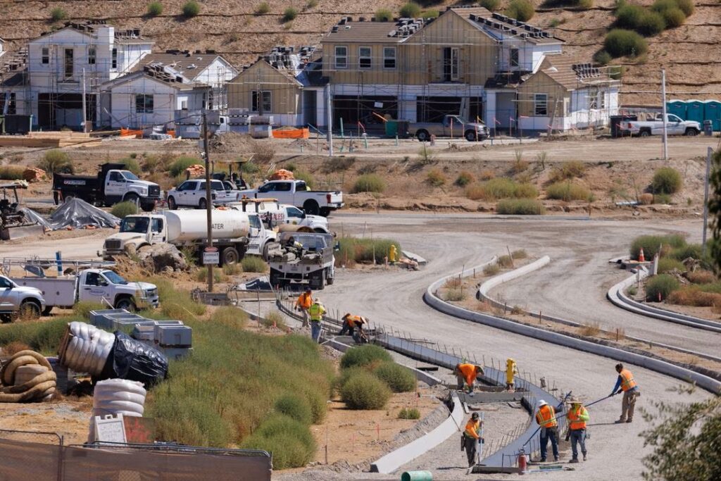 Photo of residential construction shows housing starts in a neighborhood being built